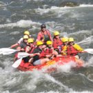 guests on raft navigating rapids on the Arkansas river Raft Masters Tours Colorado