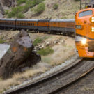 oncoming Royal Gorge train on tracks Raft Masters Colorado tour