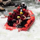 guests in raft navigating through rapids on Clear Creek Raft Masters Tours Colorado